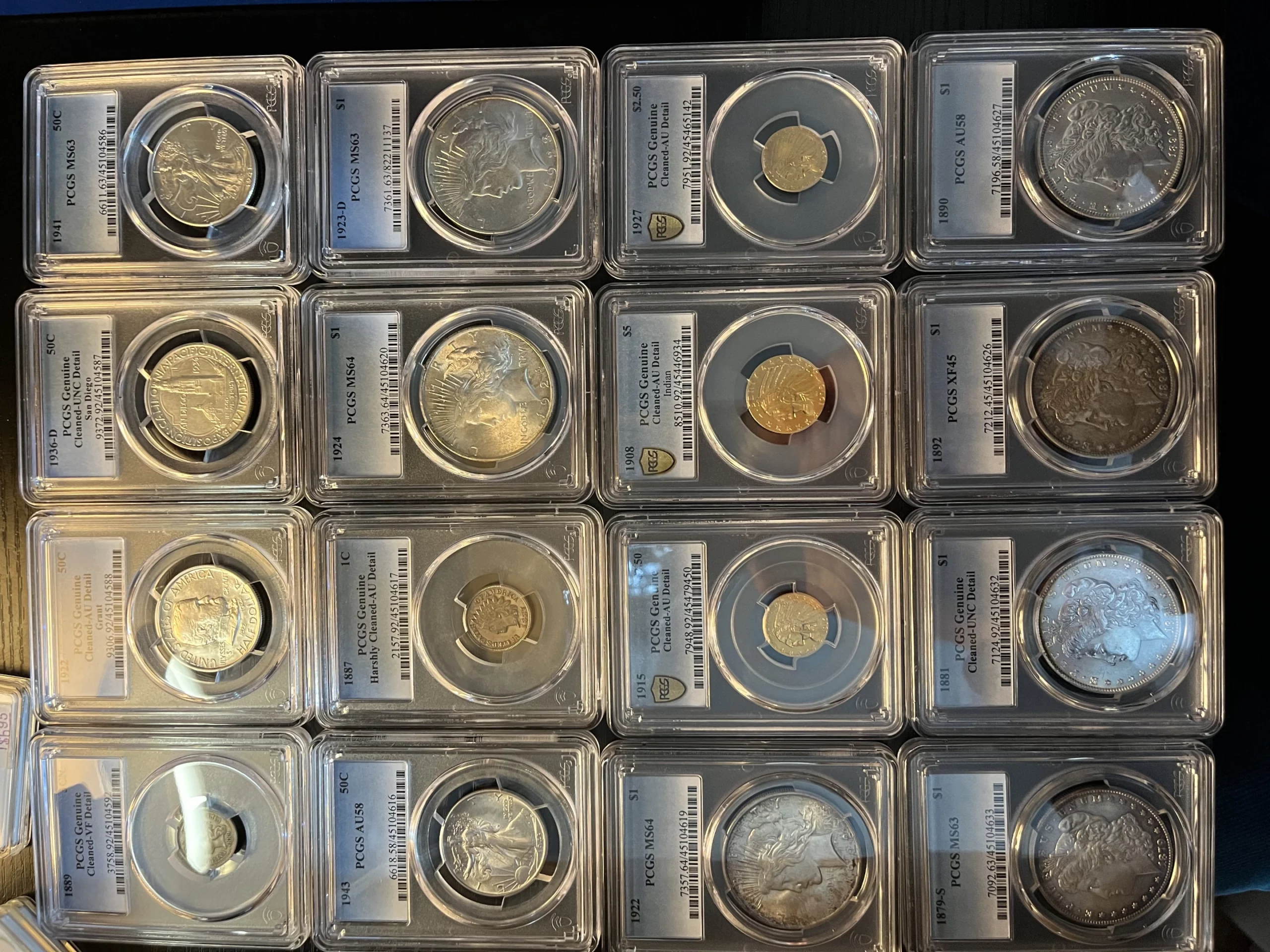 Collection of vintage gold and silver coins evaluated by a DMV coin dealer